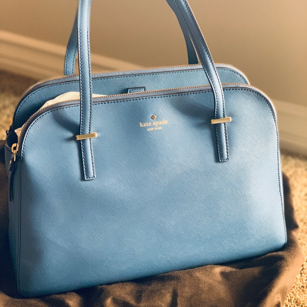 Kate Spade shoulder bag in blue color.